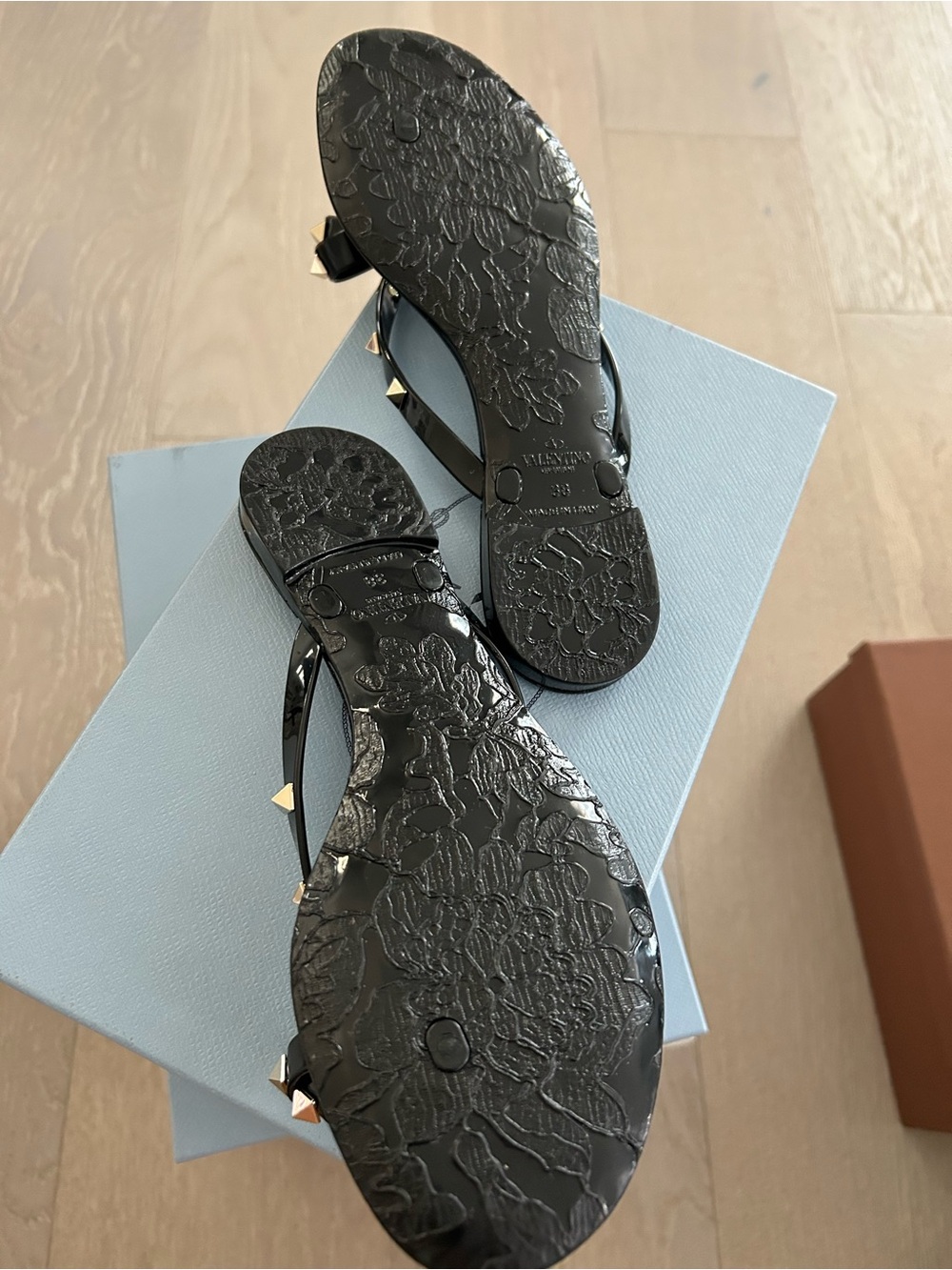 Valentino Black Jelly Rockstud Thong Sandals with Gold Accents
